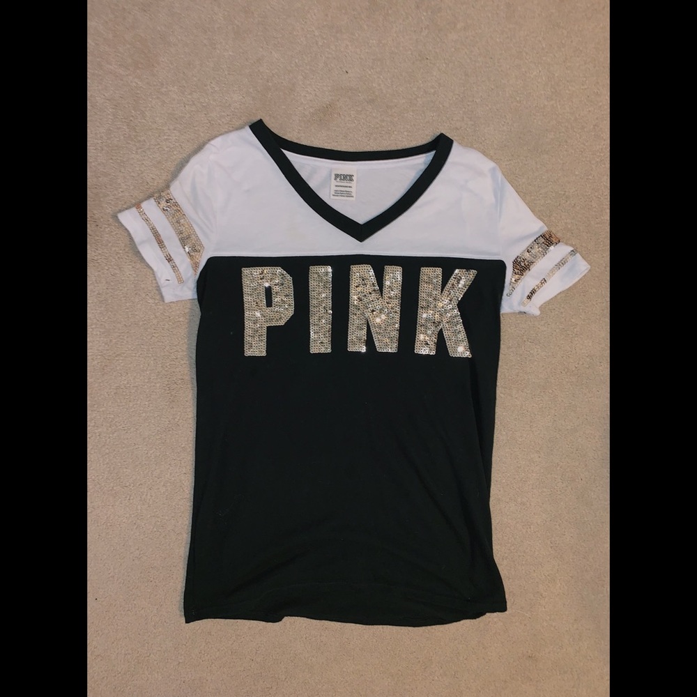 Pink shirt. Gold glitter lettering